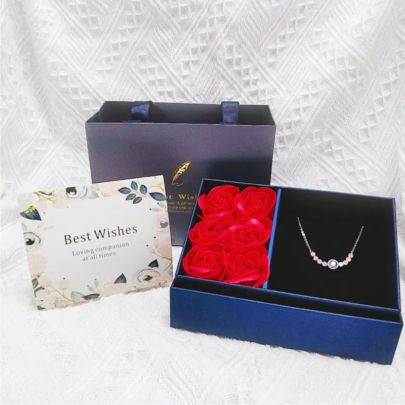 Eternal rose gift box, blue rose left, ring/necklace space right, “Best Wishes” cover