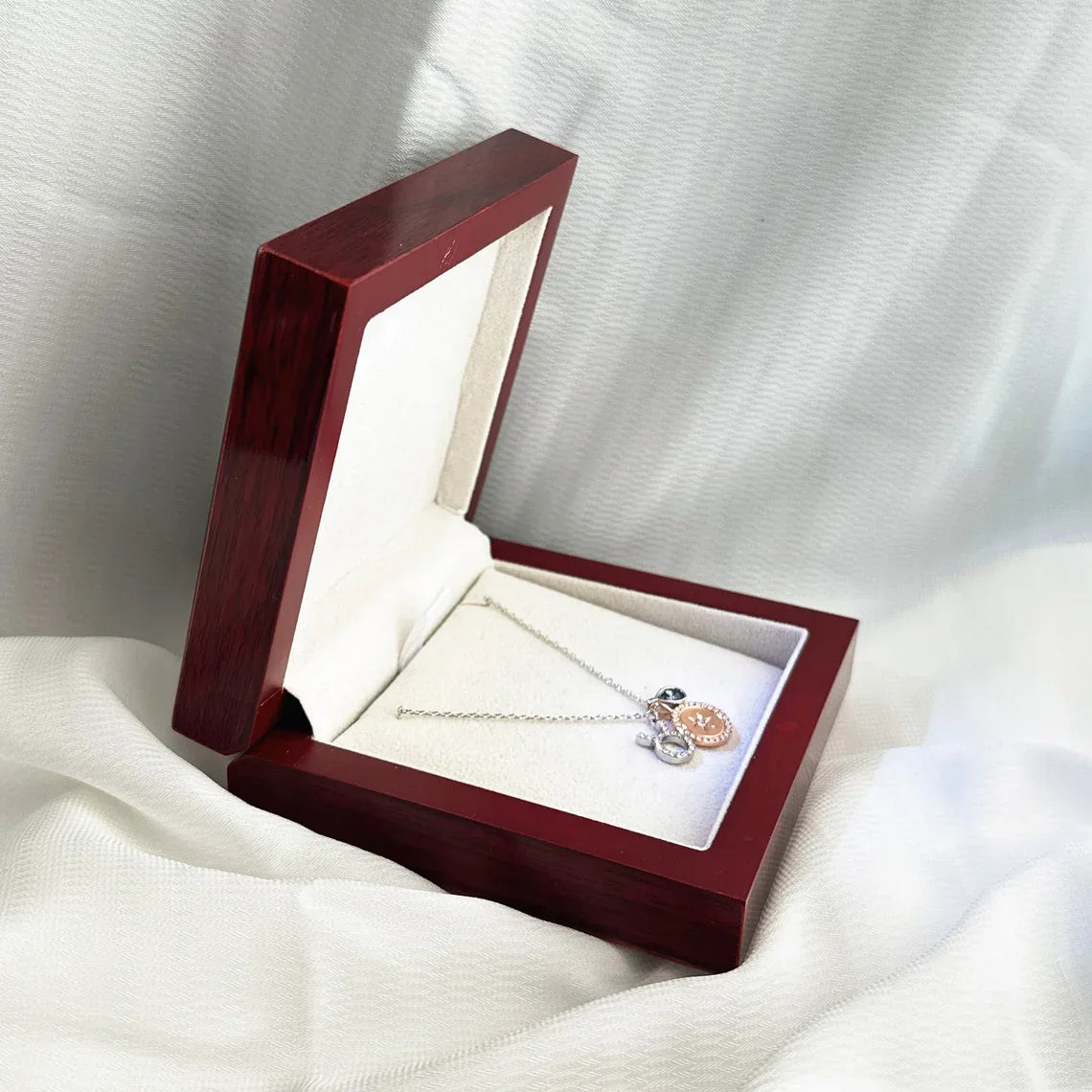 Luxury red wooden ring box, spotlight LED highlights diamond sparkle