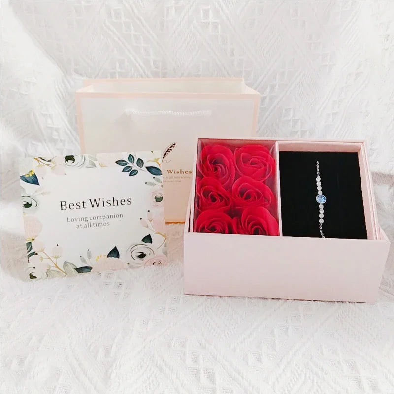 Pink preserved rose jewelry box with “Best Wishes” lid and ring space on the right