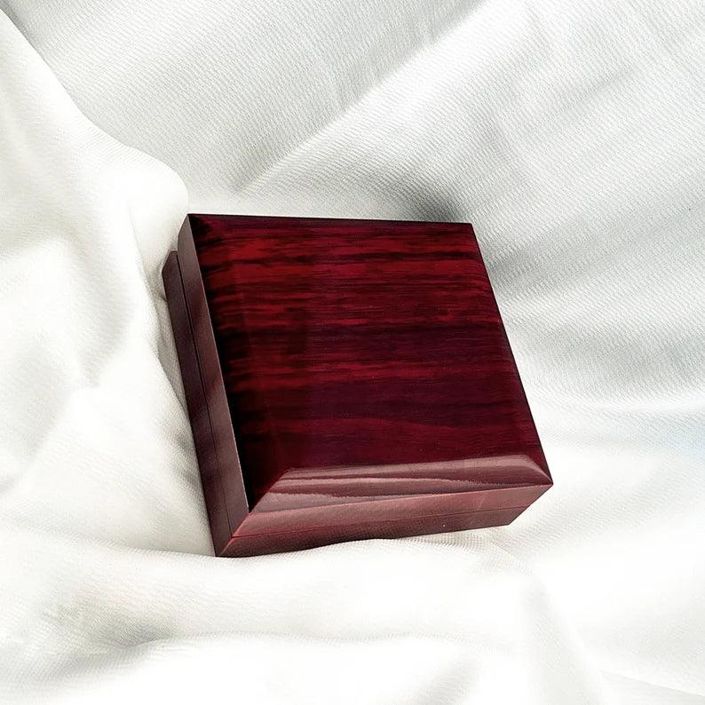 Polished red wood gift box with LED, opens to spotlight engagement ring