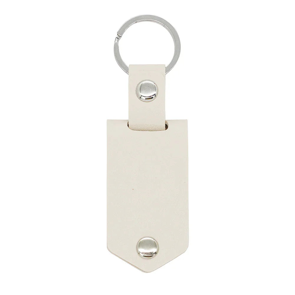Beige leather photo keychain featuring engraved message and metal photo insert keepsake