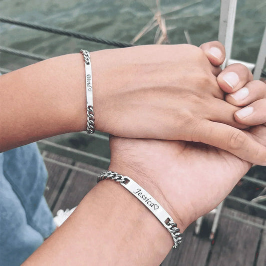 Couple name engraved bracelet set in silver with Eternal Rose Box featuring red roses, perfect personalized gift.