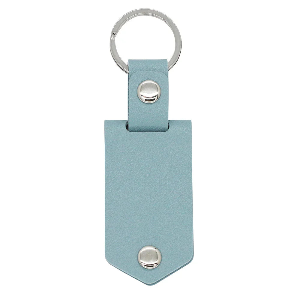Custom photo keychain in light blue leather with engraved “Drive safe” and picture insert