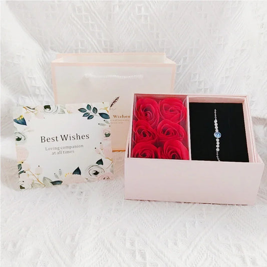Pink preserved rose jewelry box with “Best Wishes” lid and ring space on the right