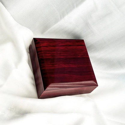 Polished red wood gift box with LED, opens to spotlight engagement ring